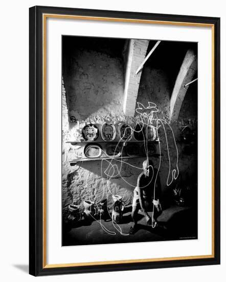 Pablo Picasso Drawing a Centaur in the Air with a Flashlight at Madoura Pottery-Gjon Mili-Framed Premium Photographic Print