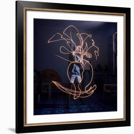 Pablo Picasso Drawing an Image Using a Light Pen-Gjon Mili-Framed Premium Photographic Print