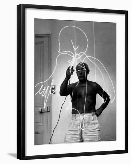 Pablo Picasso Using Flashlight to Make Light Drawing in the Air-Gjon Mili-Framed Premium Photographic Print