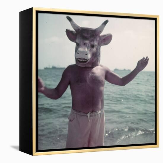 Pablo Picasso Wearing a Cow's Head Mask on Beach at Golfe Juan Near Vallauris-Gjon Mili-Framed Premier Image Canvas