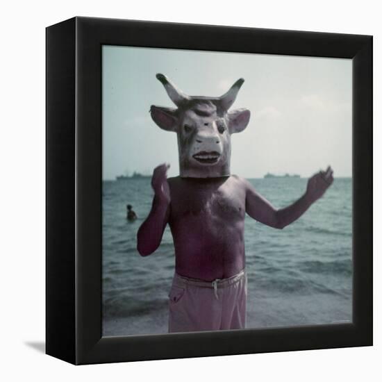 Pablo Picasso Wearing a Cow's Head Mask on Beach at Golfe Juan Near Vallauris-Gjon Mili-Framed Premier Image Canvas