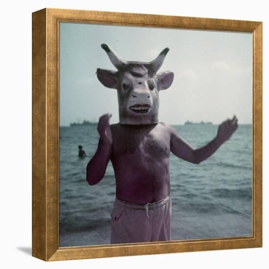 Pablo Picasso Wearing a Cow's Head Mask on Beach at Golfe Juan Near Vallauris-Gjon Mili-Framed Premier Image Canvas