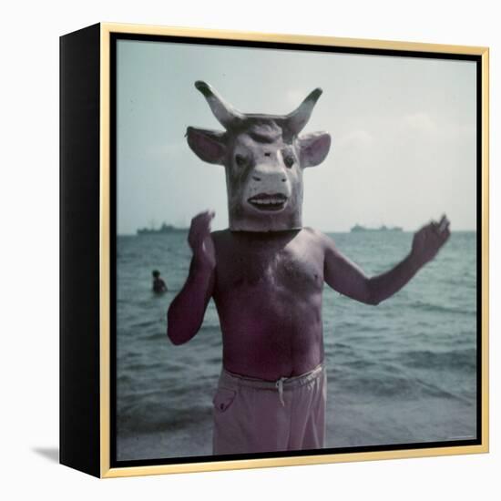 Pablo Picasso Wearing a Cow's Head Mask on Beach at Golfe Juan Near Vallauris-Gjon Mili-Framed Premier Image Canvas