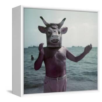 Pablo Picasso Wearing a Cow's Head Mask on Beach at Golfe Juan Near Vallauris-Gjon Mili-Framed Premier Image Canvas