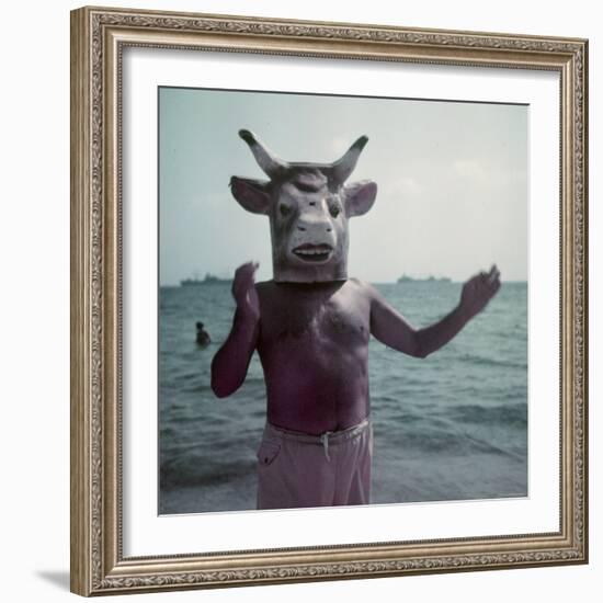 Pablo Picasso Wearing a Cow's Head Mask on Beach at Golfe Juan Near Vallauris-Gjon Mili-Framed Premium Photographic Print