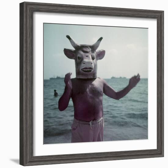 Pablo Picasso Wearing a Cow's Head Mask on Beach at Golfe Juan Near Vallauris-Gjon Mili-Framed Premium Photographic Print