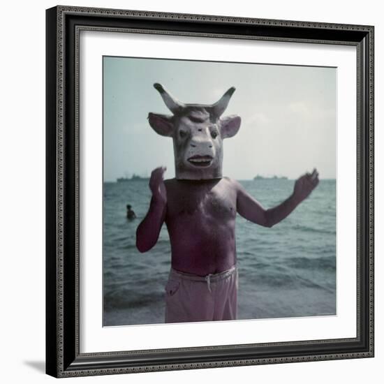 Pablo Picasso Wearing a Cow's Head Mask on Beach at Golfe Juan Near Vallauris-Gjon Mili-Framed Premium Photographic Print