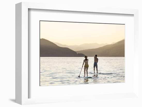 Paddleboarding on Whitefish Lake at Sunset in Whitefish, Montana, USA-Chuck Haney-Framed Photographic Print