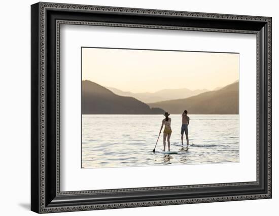 Paddleboarding on Whitefish Lake at Sunset in Whitefish, Montana, USA-Chuck Haney-Framed Photographic Print