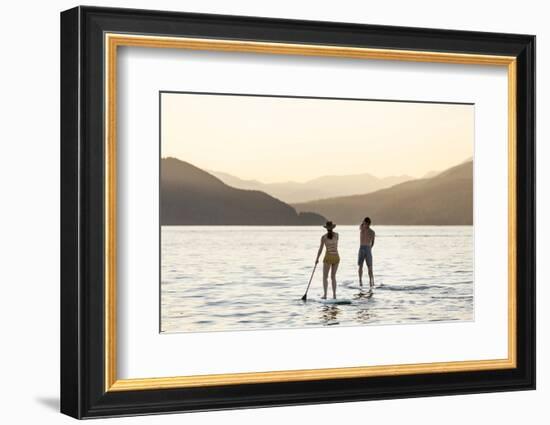 Paddleboarding on Whitefish Lake at Sunset in Whitefish, Montana, USA-Chuck Haney-Framed Photographic Print