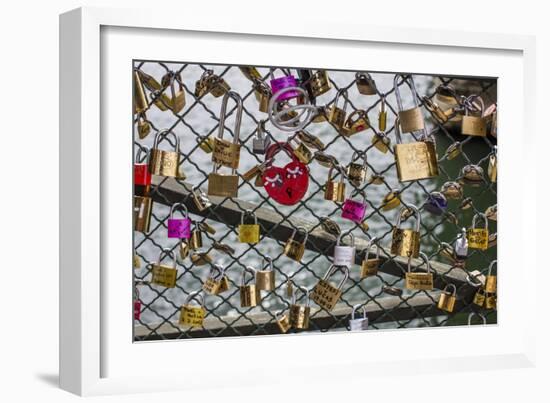 Padlocks Left By Lovers Cover Paris' Pont Des Arts Pedestrian Bridge. Paris, France-Karine Aigner-Framed Photographic Print