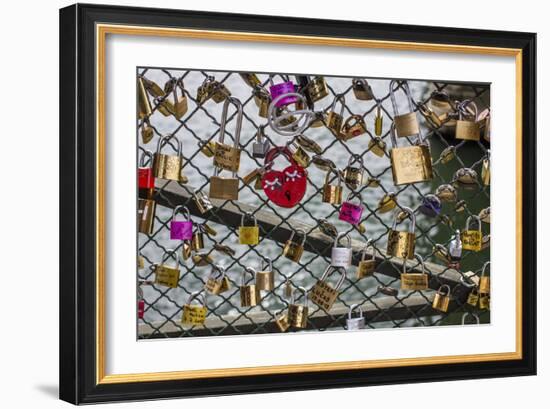 Padlocks Left By Lovers Cover Paris' Pont Des Arts Pedestrian Bridge. Paris, France-Karine Aigner-Framed Photographic Print