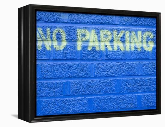 Painted Blue Brick Wall with No Parking Sign-John Nordell-Framed Premier Image Canvas