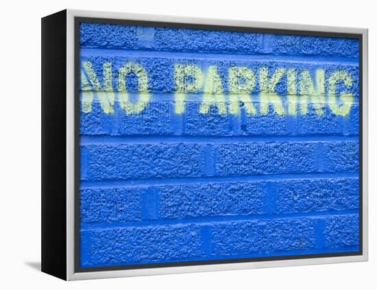 Painted Blue Brick Wall with No Parking Sign-John Nordell-Framed Premier Image Canvas