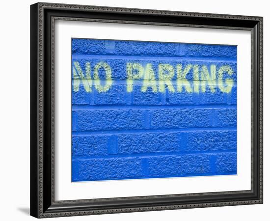 Painted Blue Brick Wall with No Parking Sign-John Nordell-Framed Photographic Print