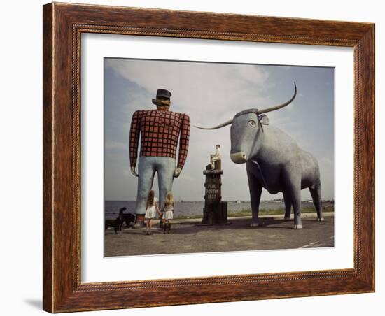 Painted Concrete Sculpture of Paul Bunyon and His Blue Ox, Babe Standing on Shores of Lake Bemidji-Andreas Feininger-Framed Photographic Print