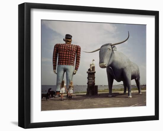 Painted Concrete Sculpture of Paul Bunyon and His Blue Ox, Babe Standing on Shores of Lake Bemidji-Andreas Feininger-Framed Photographic Print