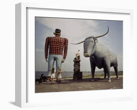 Painted Concrete Sculpture of Paul Bunyon and His Blue Ox, Babe Standing on Shores of Lake Bemidji-Andreas Feininger-Framed Photographic Print