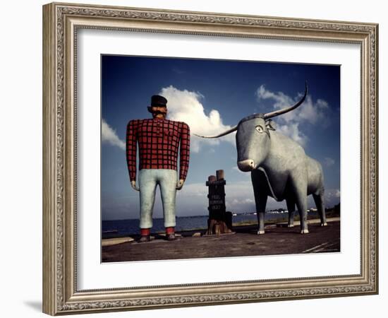 Painted Concrete Sculpture of Paul Bunyon and His Blue Ox, Babe Standing on Shores of Lake Bemidji-Andreas Feininger-Framed Photographic Print