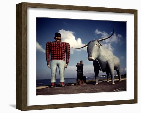 Painted Concrete Sculpture of Paul Bunyon and His Blue Ox, Babe Standing on Shores of Lake Bemidji-Andreas Feininger-Framed Photographic Print