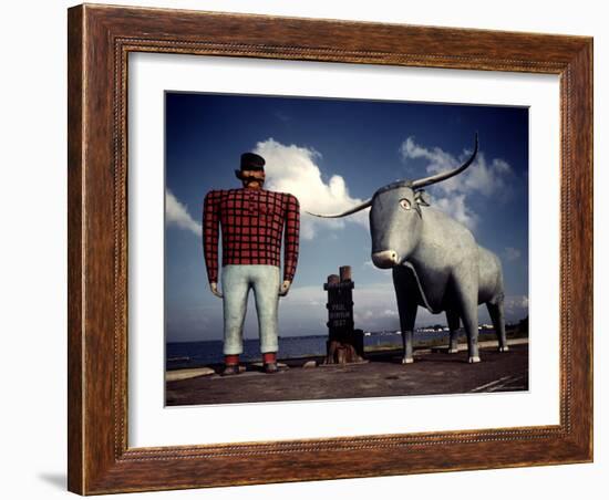 Painted Concrete Sculpture of Paul Bunyon and His Blue Ox, Babe Standing on Shores of Lake Bemidji-Andreas Feininger-Framed Photographic Print