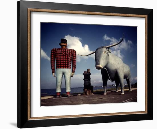 Painted Concrete Sculpture of Paul Bunyon and His Blue Ox, Babe Standing on Shores of Lake Bemidji-Andreas Feininger-Framed Photographic Print