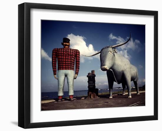 Painted Concrete Sculpture of Paul Bunyon and His Blue Ox, Babe Standing on Shores of Lake Bemidji-Andreas Feininger-Framed Photographic Print