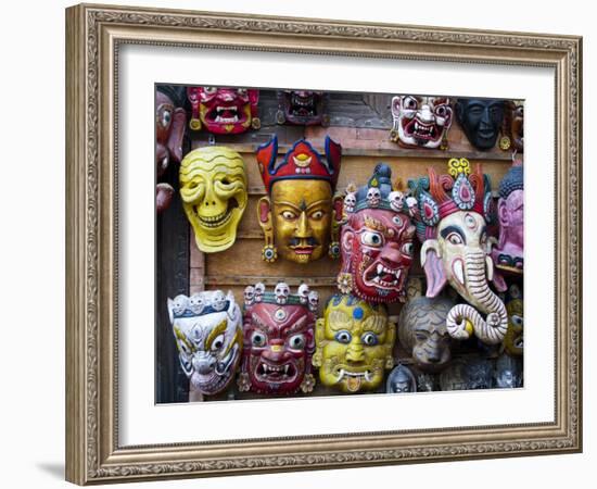 Painted face masks on display in the historical Newar city of Bhaktapur, Nepal, Asia-Alex Treadway-Framed Photographic Print