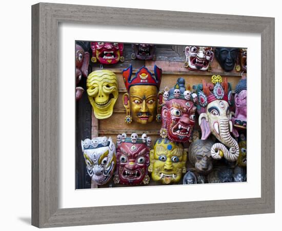 Painted face masks on display in the historical Newar city of Bhaktapur, Nepal, Asia-Alex Treadway-Framed Photographic Print