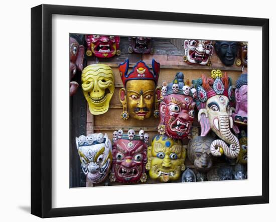 Painted face masks on display in the historical Newar city of Bhaktapur, Nepal, Asia-Alex Treadway-Framed Photographic Print