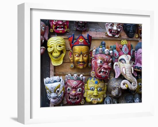 Painted face masks on display in the historical Newar city of Bhaktapur, Nepal, Asia-Alex Treadway-Framed Photographic Print