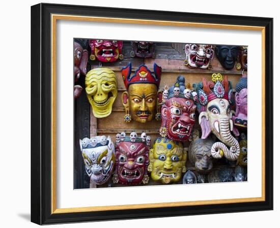 Painted face masks on display in the historical Newar city of Bhaktapur, Nepal, Asia-Alex Treadway-Framed Photographic Print