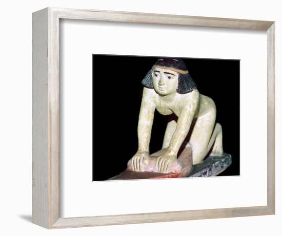 Painted figure of an Egyptian servant making bread. Artist: Unknown-Unknown-Framed Giclee Print