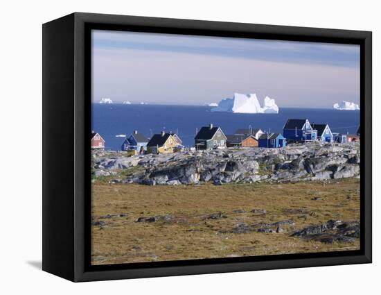 Painted Village Houses in Front of Icebergs in Disko Bay, West Coast, Greenland-Anthony Waltham-Framed Premier Image Canvas
