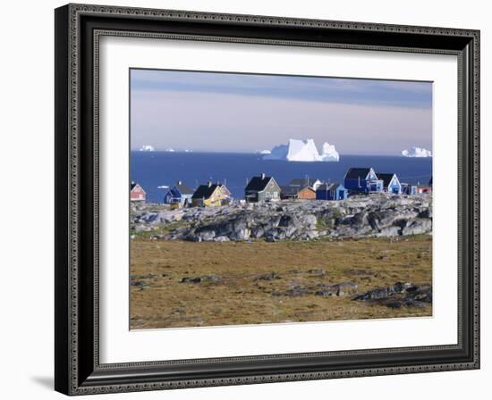 Painted Village Houses in Front of Icebergs in Disko Bay, West Coast, Greenland-Anthony Waltham-Framed Photographic Print