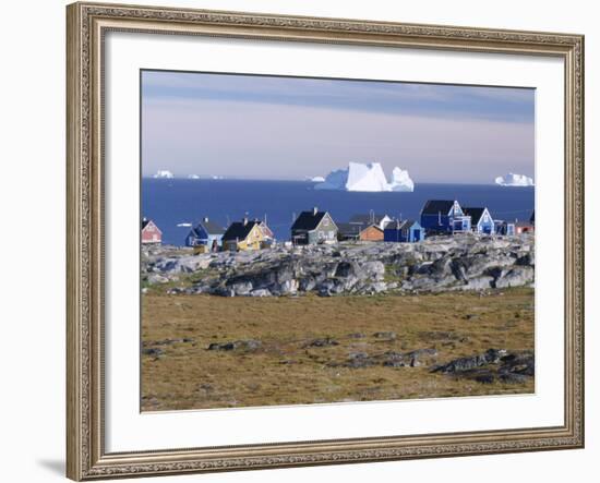 Painted Village Houses in Front of Icebergs in Disko Bay, West Coast, Greenland-Anthony Waltham-Framed Photographic Print