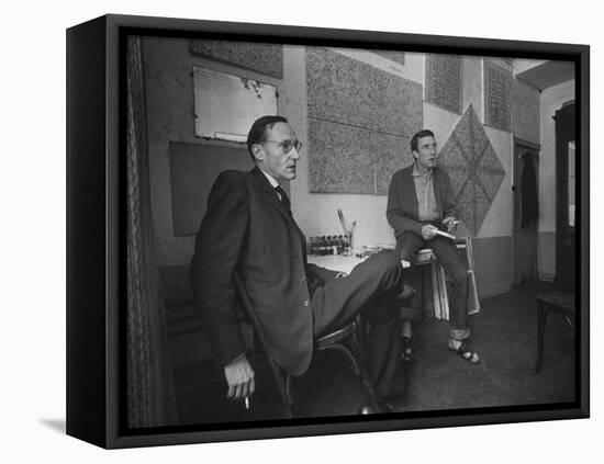 Painter Brion Gysin, Shown W His Paintings in Hotel Room in with Writer William S. Burroughs-Loomis Dean-Framed Premier Image Canvas