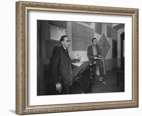 Painter Brion Gysin, Shown W His Paintings in Hotel Room in with Writer William S. Burroughs-Loomis Dean-Framed Photographic Print