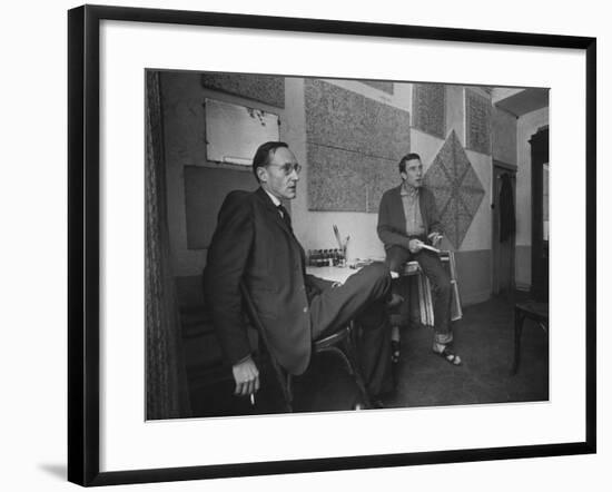 Painter Brion Gysin, Shown W His Paintings in Hotel Room in with Writer William S. Burroughs-Loomis Dean-Framed Photographic Print