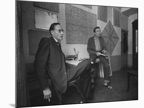 Painter Brion Gysin, Shown W His Paintings in Hotel Room in with Writer William S. Burroughs-Loomis Dean-Mounted Photographic Print