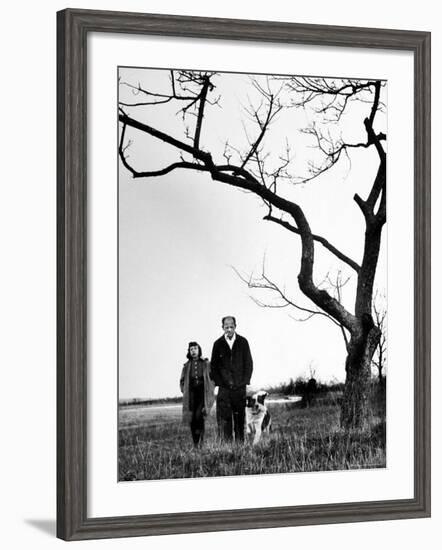 Painter Jackson Pollock Walking in Field with Wife Lee Krasner-Martha Holmes-Framed Photographic Print