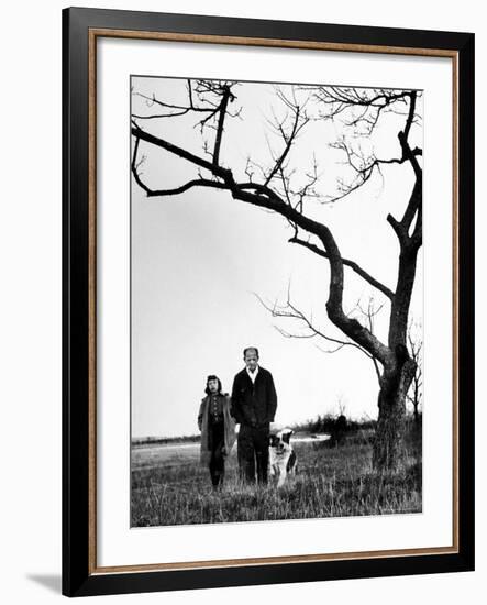 Painter Jackson Pollock Walking in Field with Wife Lee Krasner-Martha Holmes-Framed Photographic Print