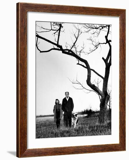 Painter Jackson Pollock Walking in Field with Wife Lee Krasner-Martha Holmes-Framed Photographic Print