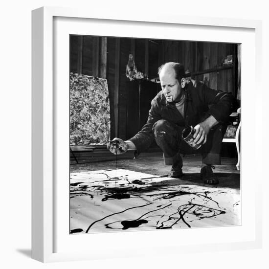 Painter Jackson Pollock Working in His Studio, Cigarette in Mouth, Dropping Paint onto Canvas-Martha Holmes-Framed Premium Photographic Print