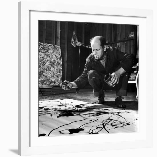 Painter Jackson Pollock Working in His Studio, Cigarette in Mouth, Dropping Paint onto Canvas-Martha Holmes-Framed Premium Photographic Print