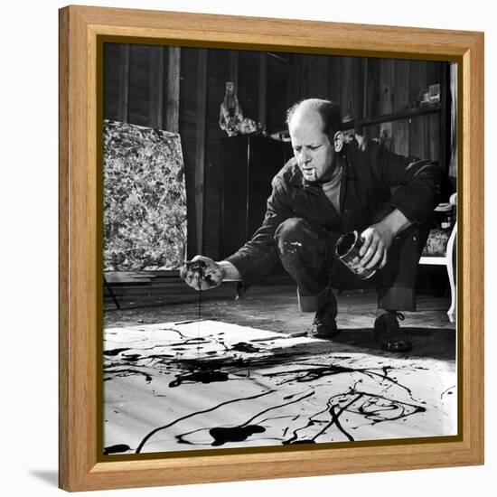 Painter Jackson Pollock Working in His Studio, Cigarette in Mouth, Dropping Paint Onto Canvas-Martha Holmes-Framed Premier Image Canvas