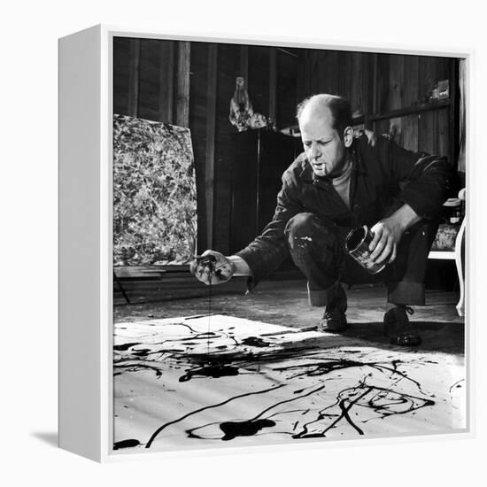 Painter Jackson Pollock Working in His Studio, Cigarette in Mouth, Dropping Paint Onto Canvas-Martha Holmes-Framed Premier Image Canvas