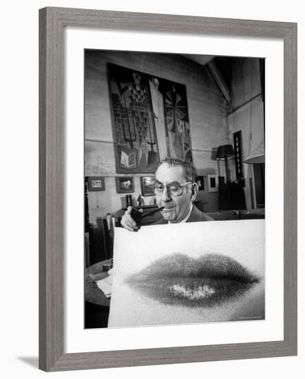 Painter Photographer Man Ray Holding Up "Lips" Print, Winking at Camera and Smoking a Pipe-Loomis Dean-Framed Premium Photographic Print