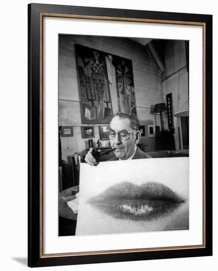 Painter Photographer Man Ray Holding Up "Lips" Print, Winking at Camera and Smoking a Pipe-Loomis Dean-Framed Premium Photographic Print