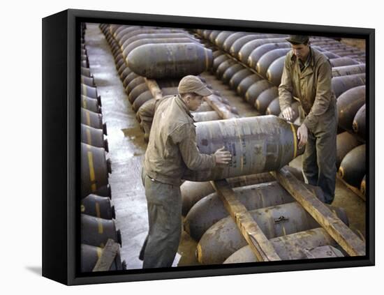 Pair of American Servicemen Moving a Large Bomb at an Ammunition Dump During WWII-null-Framed Premier Image Canvas